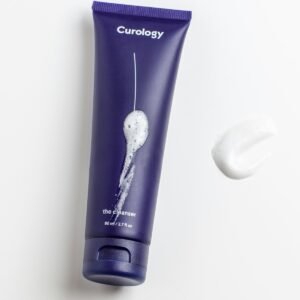 Cosmetic bottle with soft shadows on neutral background