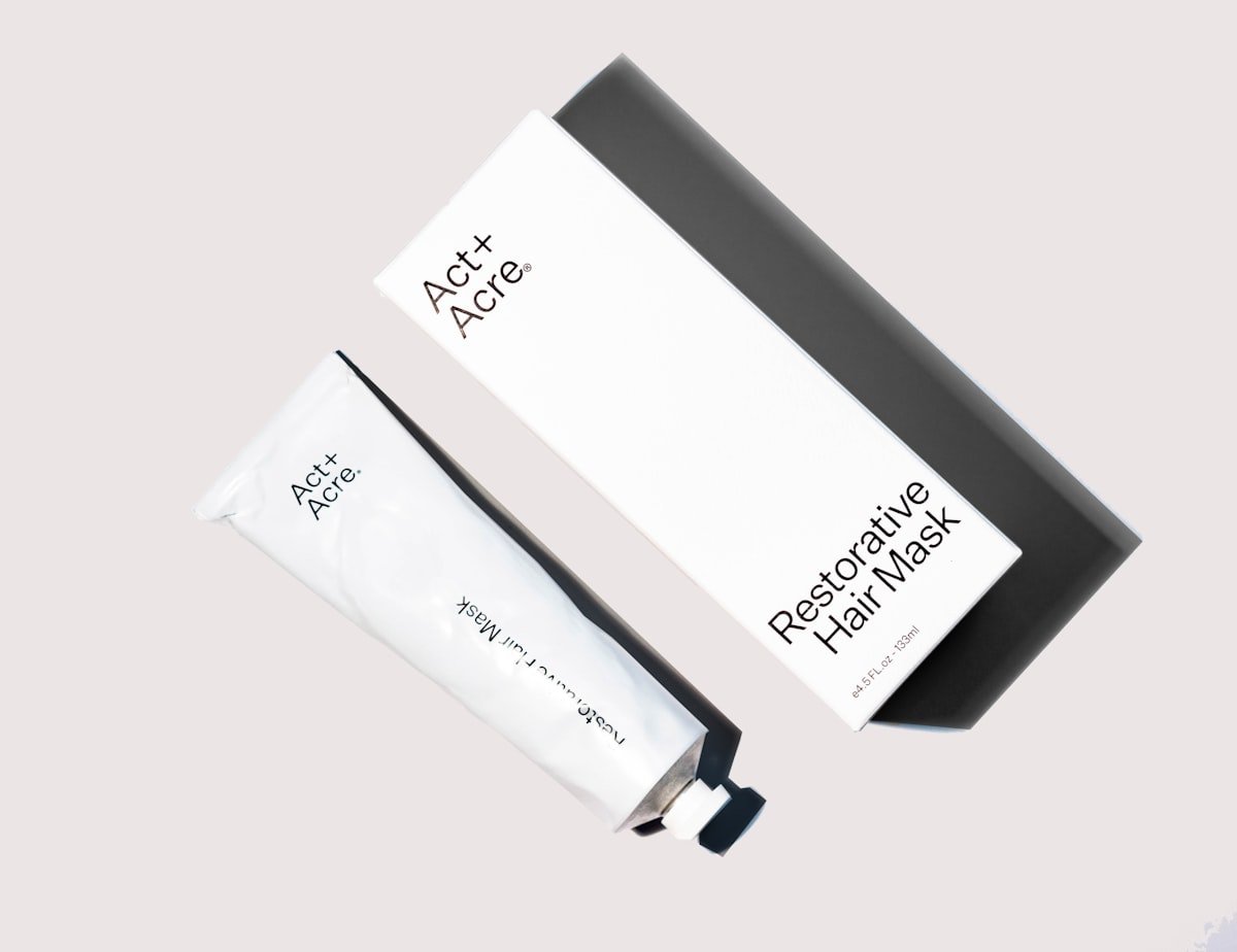 Skincare cream jar on a minimal beige background